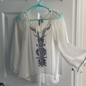 White flowery blouse